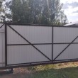 Откатные ворота из профнастила автоматические на в/с